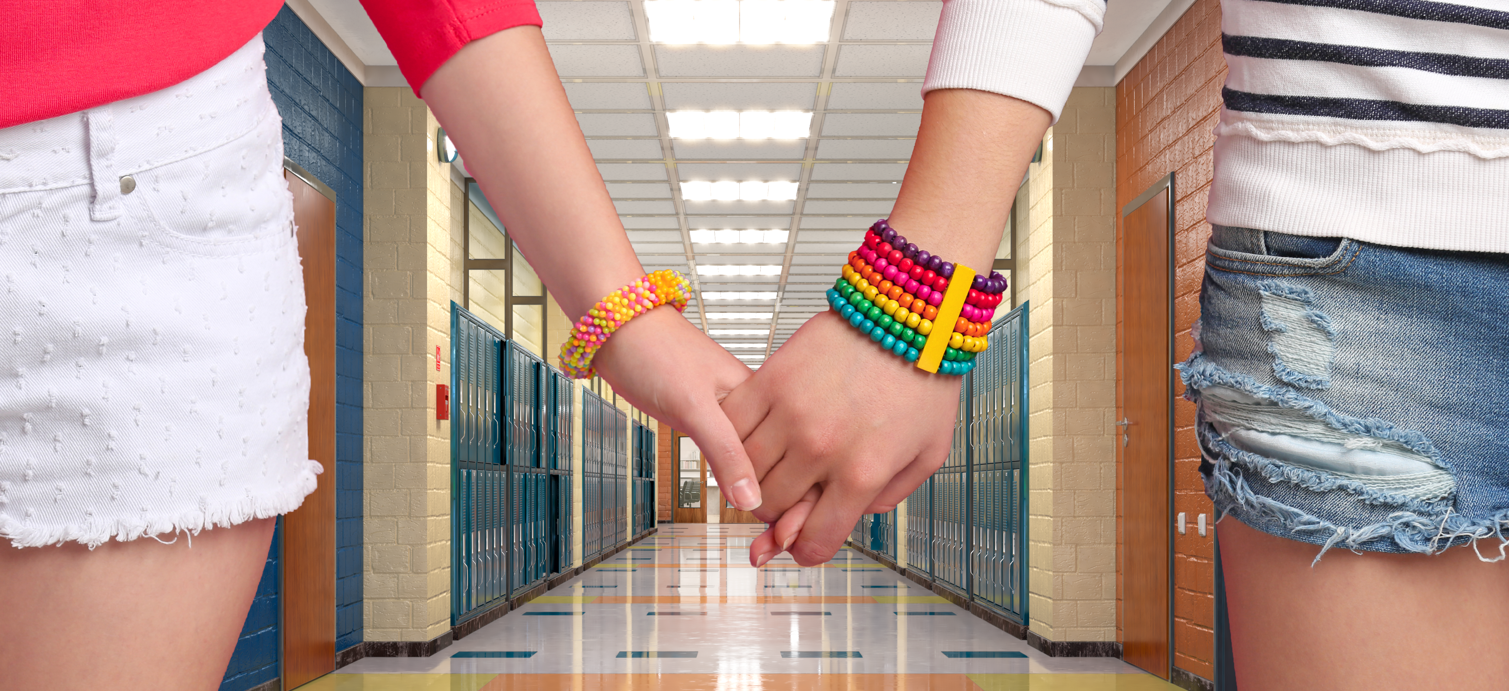 girls holding hands in hallway 01 01